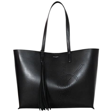 saint laurent perforated ysl shopping tote|ysl paniers and totes sale.